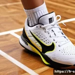 Home 22 라켓 스포츠용 신발 리뷰 - A close-up shot of a pair of high-performance racket sport shoes designed for indoor use, placed on ...